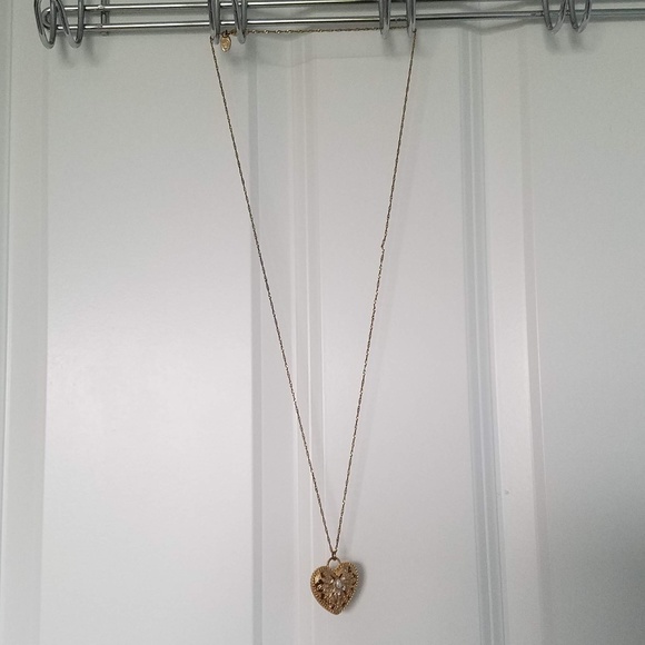 Jewelry - Long heart pendant necklace, heart open.